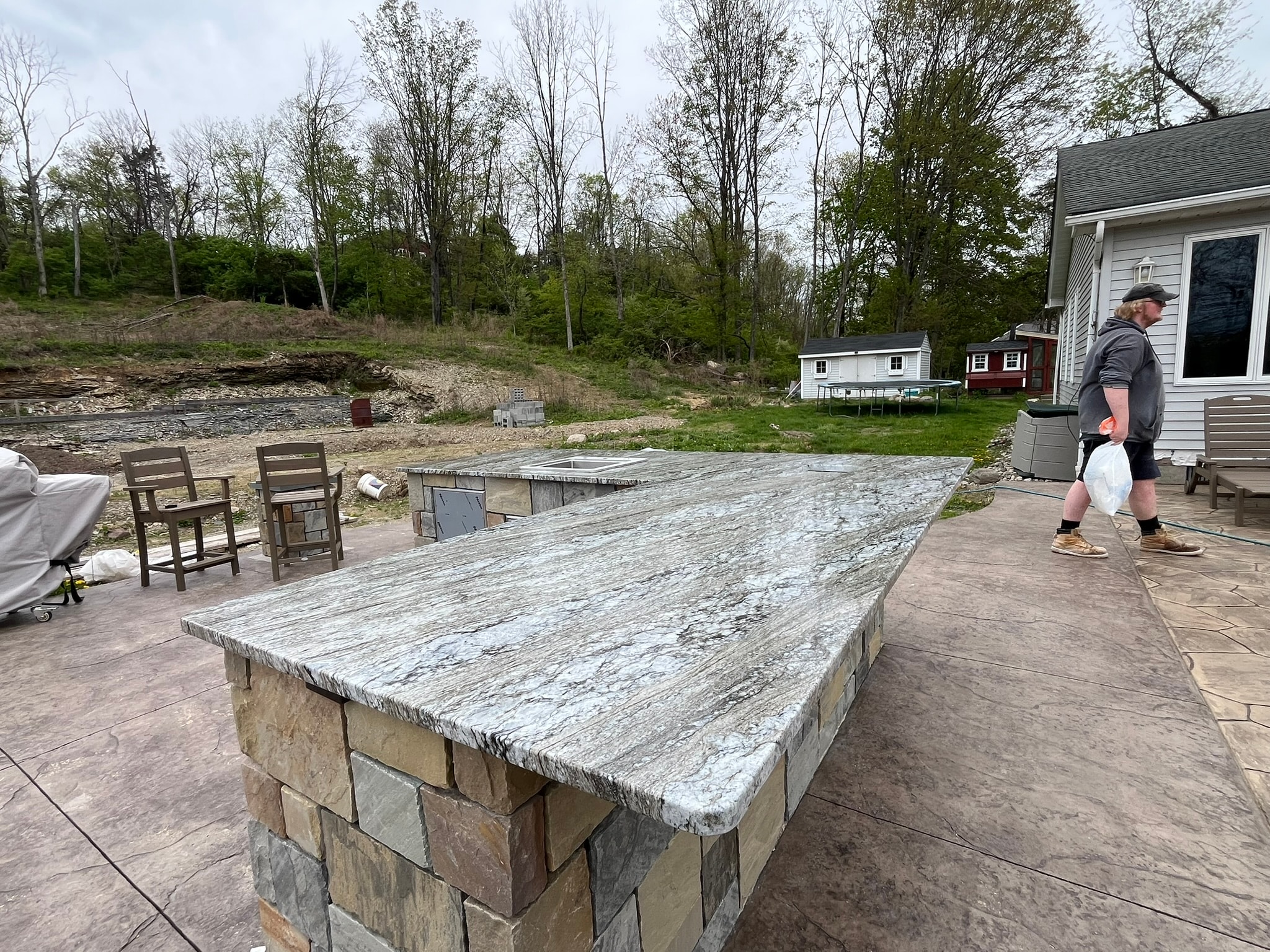 Outdoor granite countertop patio kitchen — side view
