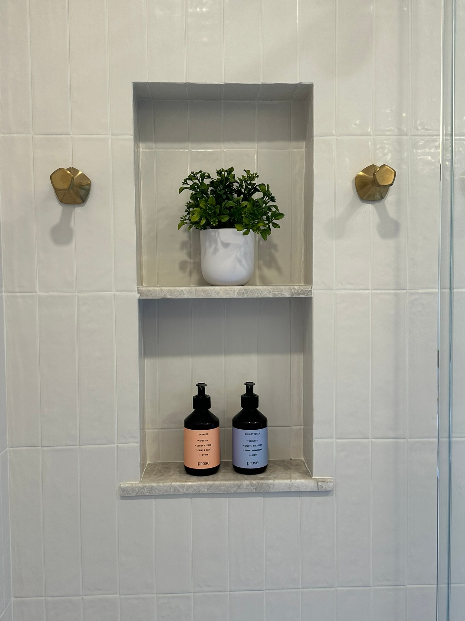 Shower niche with marble shelving